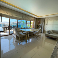 Sale of a 4+1 penthouse with a beautiful interior and magnificent views in Mahmutlar