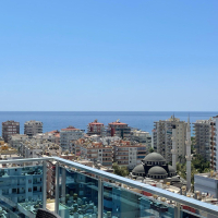 Sale of a 4+1 penthouse with a beautiful interior and magnificent views in Mahmutlar