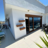 Sale of a 4+1 penthouse with a beautiful interior and magnificent views in Mahmutlar