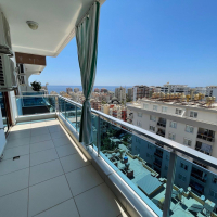 Sale of a 4+1 penthouse with a beautiful interior and magnificent views in Mahmutlar