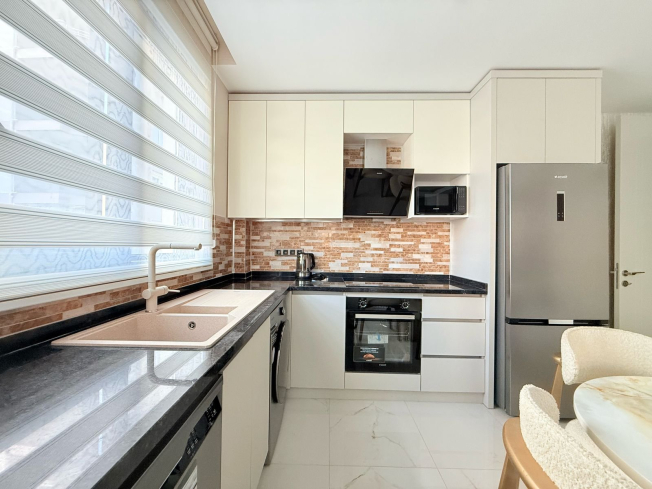 Cozy and Stylish 2+1 Apartment Just 150 Meters from the Sea in the Heart of Mahmutlar!