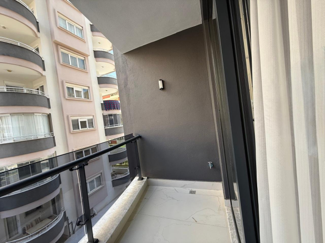Cozy and Stylish 2+1 Apartment Just 150 Meters from the Sea in the Heart of Mahmutlar!