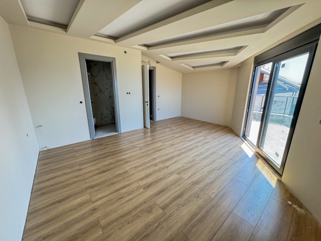 Spacious 4+1 penthouse in a brand-new building  just 50 meters from the sandy beach in the prestigious Oba area