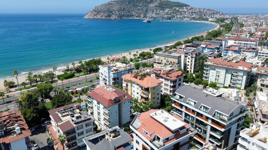Spacious 4+1 penthouse in a brand-new building  just 50 meters from the sandy beach in the prestigious Oba area