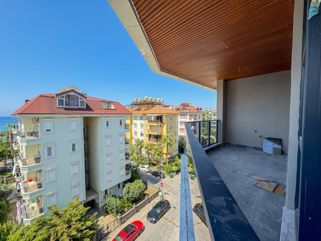 Spacious 4+1 penthouse in a brand-new building  just 50 meters from the sandy beach in the prestigious Oba area