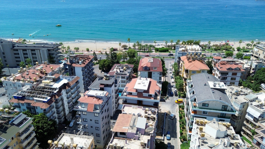 Spacious 4+1 penthouse in a brand-new building  just 50 meters from the sandy beach in the prestigious Oba area
