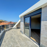 Spacious 4+1 penthouse in a brand-new building  just 50 meters from the sandy beach in the prestigious Oba area