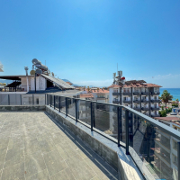 Spacious 4+1 penthouse in a brand-new building  just 50 meters from the sandy beach in the prestigious Oba area