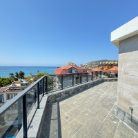 Spacious 4+1 penthouse in a brand-new building  just 50 meters from the sandy beach in the prestigious Oba area