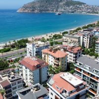 Spacious 4+1 penthouse in a brand-new building  just 50 meters from the sandy beach in the prestigious Oba area