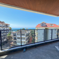 Spacious 4+1 penthouse in a brand-new building  just 50 meters from the sandy beach in the prestigious Oba area