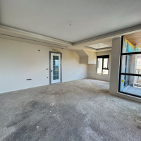 Spacious 4+1 penthouse in a brand-new building  just 50 meters from the sandy beach in the prestigious Oba area