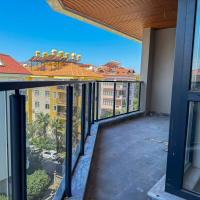 Spacious 4+1 penthouse in a brand-new building  just 50 meters from the sandy beach in the prestigious Oba area