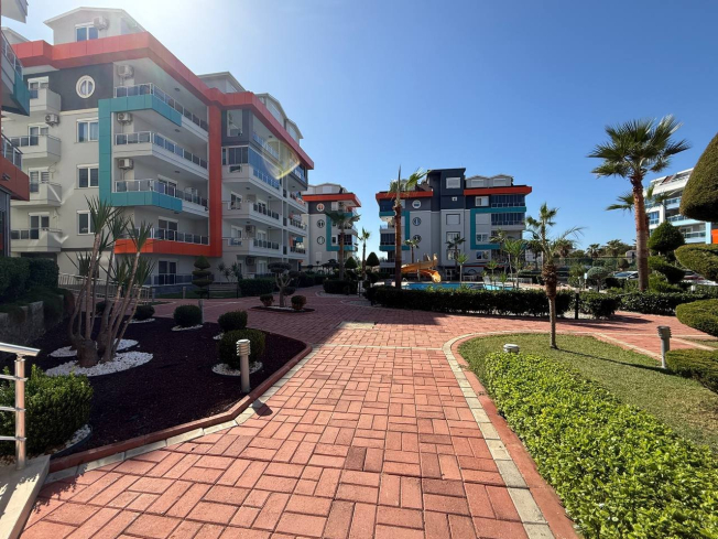 1+1 Apartment in Kestel Residence — 200 m to the Sea, Fully Furnished with Sea View