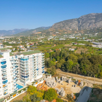 Cozy Furnished 1+1 Apartment in Mahmutlar with Mountain View and Full Facilities