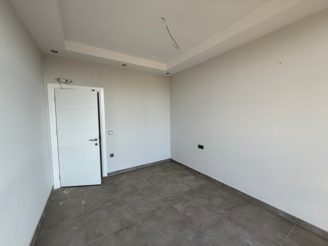 Modern 1+1 Apartment with Sea and Mountain Views in Mahmutlar at a Great Price