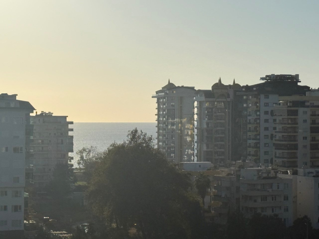 Modern 1+1 Apartment with Sea and Mountain Views in Mahmutlar at a Great Price