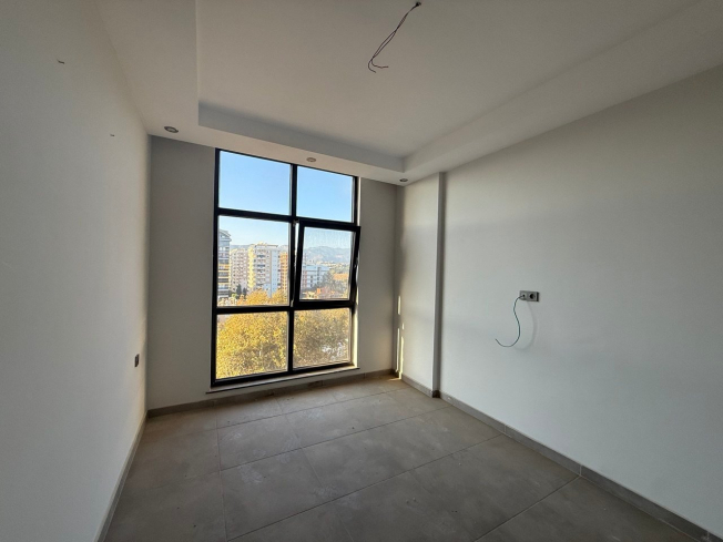 Modern 1+1 Apartment with Sea and Mountain Views in Mahmutlar at a Great Price