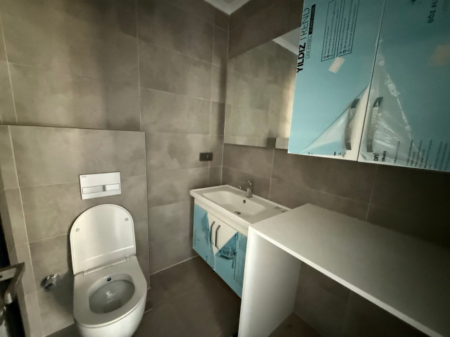 Modern 1+1 Apartment with Sea and Mountain Views in Mahmutlar at a Great Price