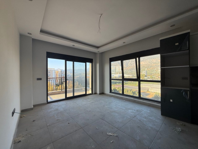 Modern 1+1 Apartment with Sea and Mountain Views in Mahmutlar at a Great Price