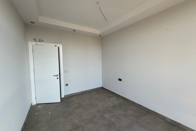 Modern 1+1 Apartment with Sea and Mountain Views in Mahmutlar at a Great Price