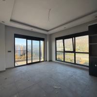 Modern 1+1 Apartment with Sea and Mountain Views in Mahmutlar at a Great Price