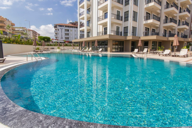 Fully Furnished 1+1 Near the Beach — Eligible for Residence Permit