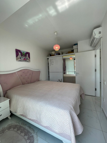 Fully furnished 1+1 in Alanya center — residence permit eligible, 600 m from the sea