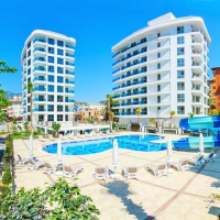 Fully furnished 1+1 in Alanya center — residence permit eligible, 600 m from the sea