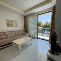 Fully furnished 1+1 in Alanya center — residence permit eligible, 600 m from the sea
