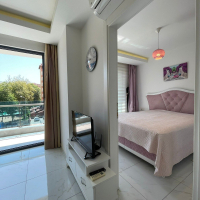 Fully furnished 1+1 in Alanya center — residence permit eligible, 600 m from the sea