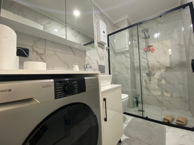 Modern 2+1 Apartment with Private Garden and Direct Pool Access in Demirtaş