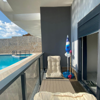 Modern 2+1 Apartment with Private Garden and Direct Pool Access in Demirtaş