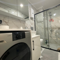 Modern 2+1 Apartment with Private Garden and Direct Pool Access in Demirtaş