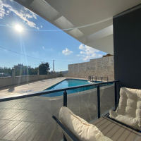 Modern 2+1 Apartment with Private Garden and Direct Pool Access in Demirtaş