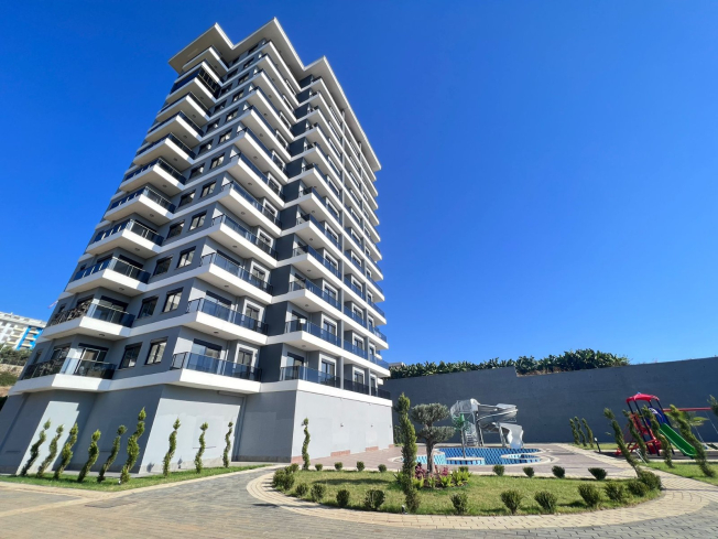 Modern 1+1 Apartment with Sea View in Mahmutlar — Attractive Investment Opportunity