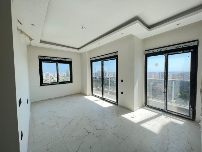 Modern 1+1 Apartment with Sea View in Mahmutlar — Attractive Investment Opportunity