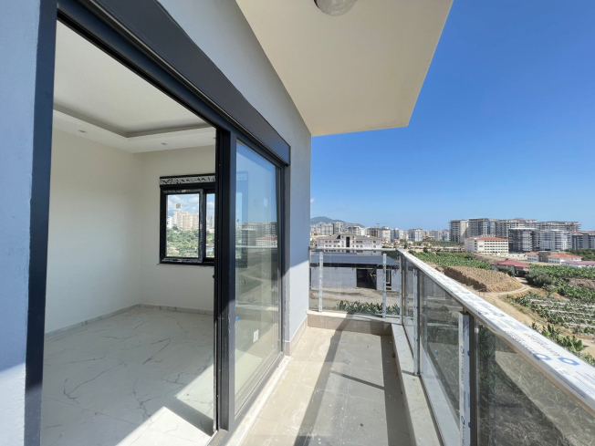 Modern 1+1 Apartment with Sea View in Mahmutlar — Attractive Investment Opportunity