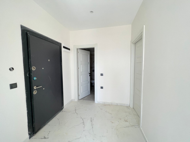 Modern 1+1 Apartment with Sea View in Mahmutlar — Attractive Investment Opportunity