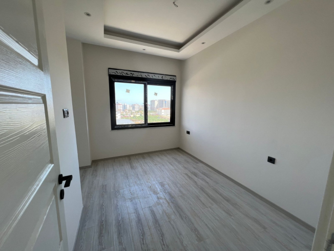 Modern 1+1 Apartment with Sea View in Mahmutlar — Attractive Investment Opportunity