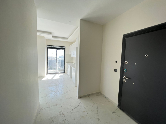 Modern 1+1 Apartment with Sea View in Mahmutlar — Attractive Investment Opportunity