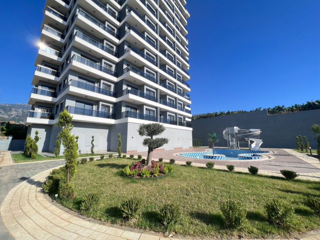 Modern 1+1 Apartment with Sea View in Mahmutlar — Attractive Investment Opportunity