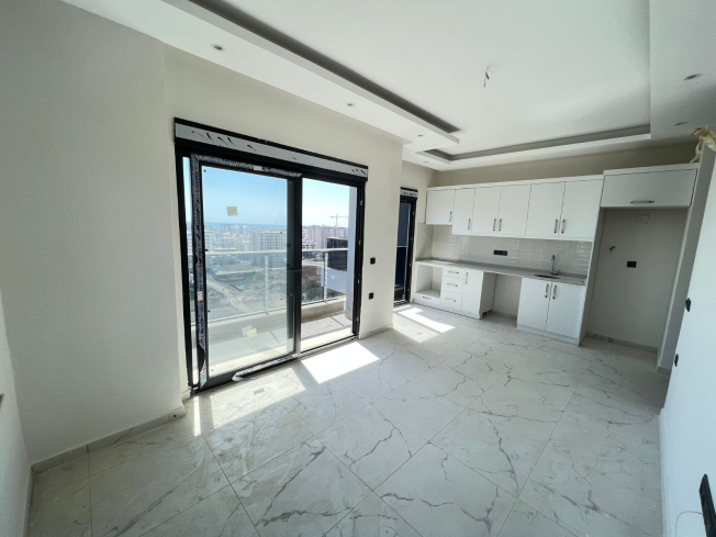 Modern 1+1 Apartment with Sea View in Mahmutlar — Attractive Investment Opportunity