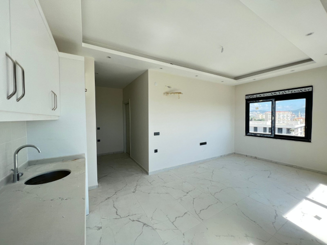 Modern 1+1 Apartment with Sea View in Mahmutlar — Attractive Investment Opportunity