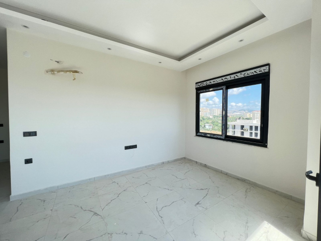 Modern 1+1 Apartment with Sea View in Mahmutlar — Attractive Investment Opportunity