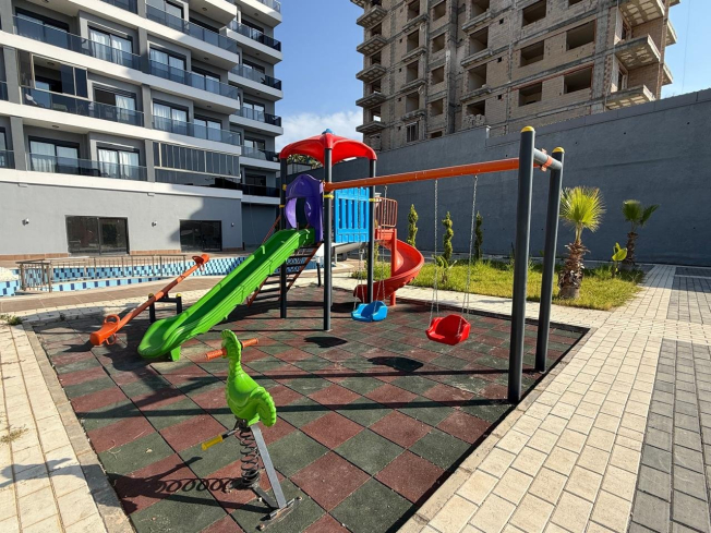 Modern 1+1 Apartment with Sea View in Mahmutlar — Attractive Investment Opportunity