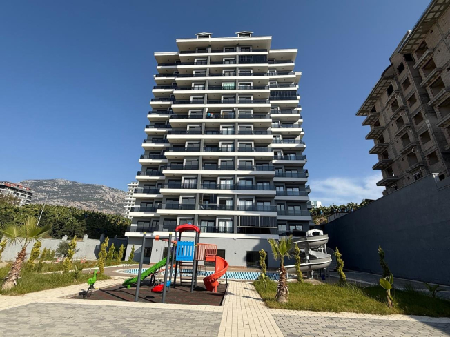 Modern 1+1 Apartment with Sea View in Mahmutlar — Attractive Investment Opportunity
