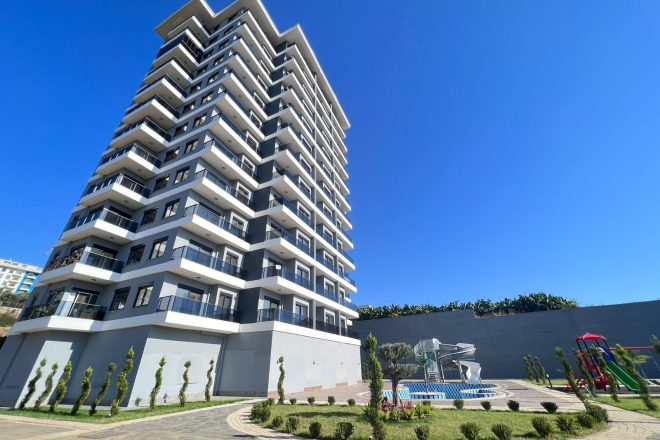 Modern 1+1 Apartment with Sea View in Mahmutlar — Attractive Investment Opportunity