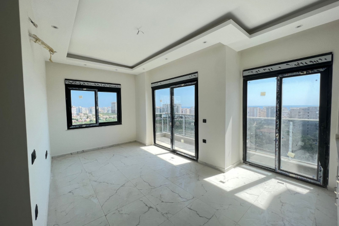 Modern 1+1 Apartment with Sea View in Mahmutlar — Attractive Investment Opportunity