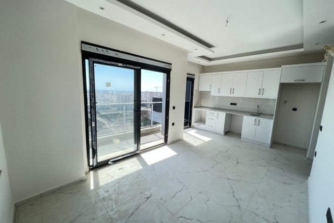 Modern 1+1 Apartment with Sea View in Mahmutlar — Attractive Investment Opportunity